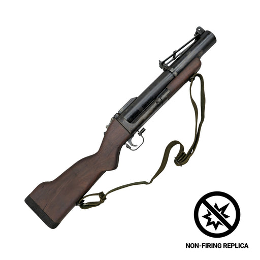 M79 40mm grenade launcher non-firing replica with sling, angled view